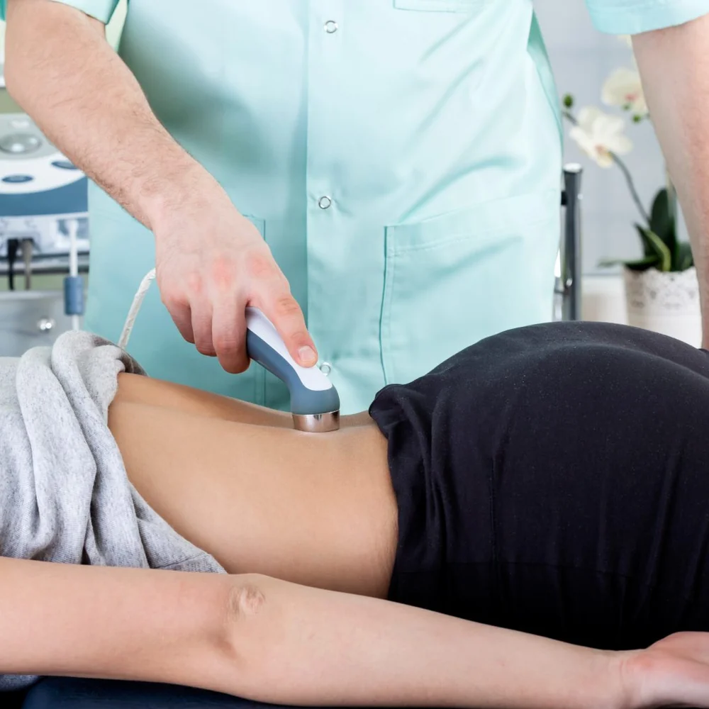 Class 4 laser therapy applied to the lower back